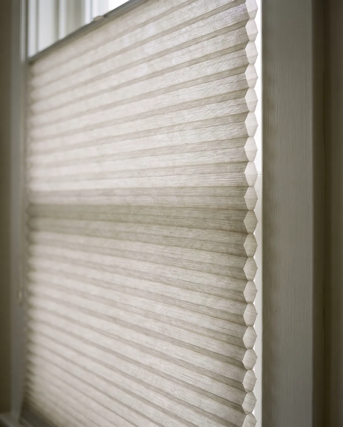 Honeycomb Shades — Crisp horizontal pleats with insulating cells